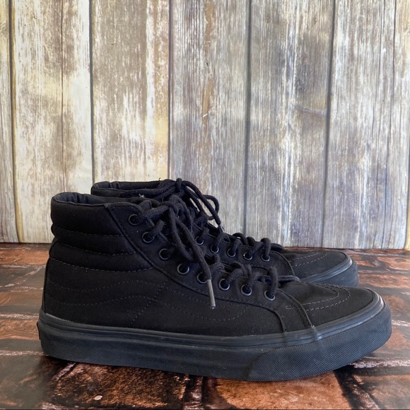 solid black high top vans